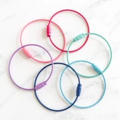 Twist Lock Floss Bobbin Rings 12 Twist Lock Floss Bobbin Rings -Olympus Handmade Store stitched modern twist lock bobbin ring 03
